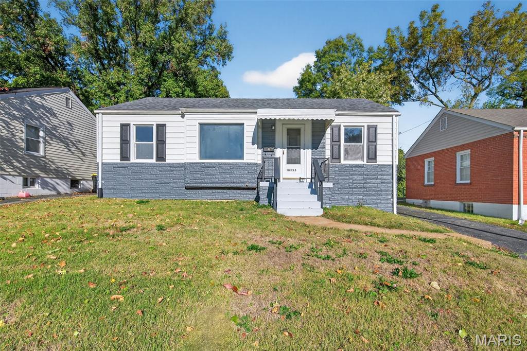 Welcome home to this charming 2-bedroom, 1-bath ranch in the heart of St. Ann! This move-in-ready home features beautifully refinished hardwood floors and fresh interior paint throughout. The updated kitchen and living area offer a warm, inviting atmosphere perfect for everyday living. Recent updates include a new roof and water heater, providing peace of mind for years to come. The clean, open basement boasts epoxy-coated floors with freshly painted walls and ceiling, offering excellent potential for additional living space, recreation, or storage. Conveniently located near parks, shopping, and major highways — this one is ready for its next owner to move right in and enjoy!
