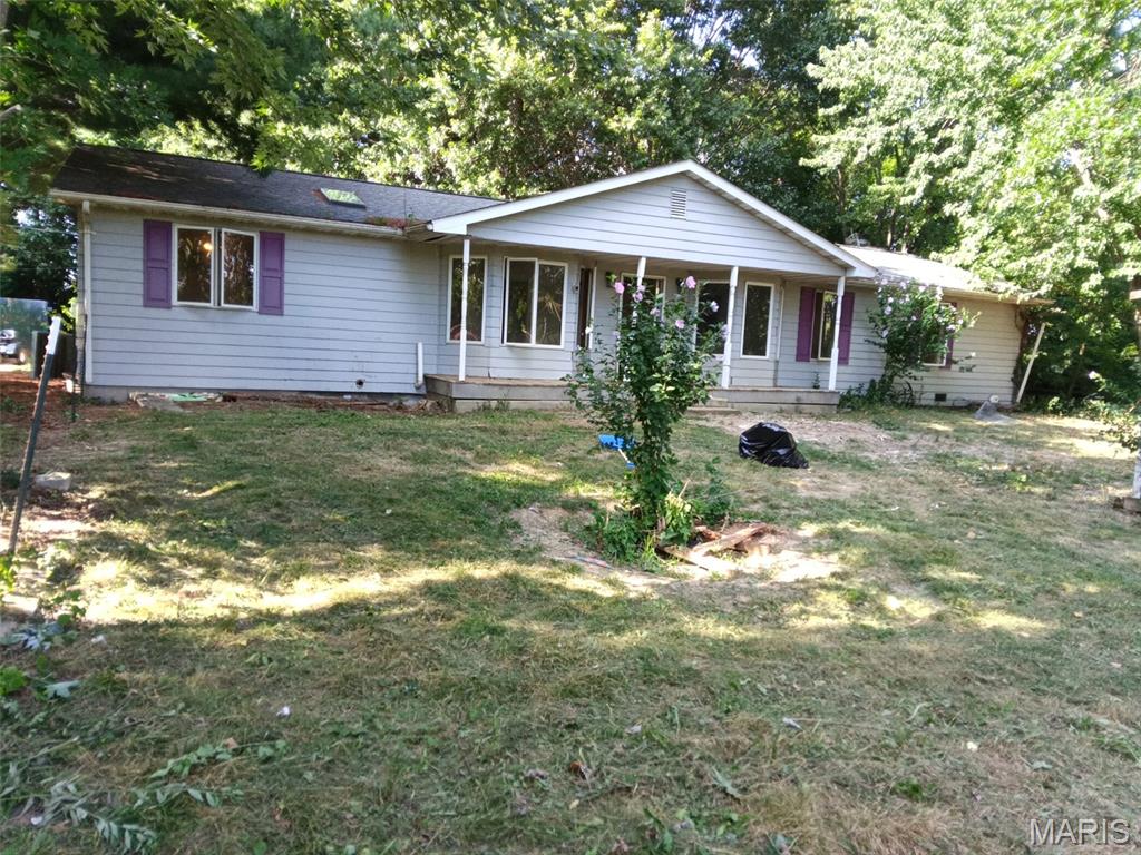 Country Charm on 10 Acres, Horses, Outbuildings & Room to Grow!
Looking for space, privacy, and endless possibilities? This 10-acre property is a rare find for anyone dreaming of country living with room for animals, hobbies, or a small hobby farm.  The home offers approximately 1,800 sq ft on the main level, featuring 3 bedrooms and 2 full baths. The full basement adds around 700 +/- sq ft of additional living space, including 2 bonus rooms perfect for a home office, hobby space, or non-conforming bedrooms, plus an additional living room and a full bath. That's flexible square footage for a growing family, multigenerational living, or extra guest space.  Outside, the property truly shines. A massive 30x60x12' metal barn offers serious storage or workshop potential, while the 40x40x10' horse stall barn is ready for your horses or livestock. Additional chicken coops and outbuildings round out the setup for anyone wanting to raise animals, garden, or simply have more storage and workspace than they'll ever need. The real value here is the land, 10 beautiful acres of pasture and trees, offering privacy, space to roam, and endless potential. The home and property could use some updating and TLC, and are priced accordingly to reflect that. This is a fantastic opportunity to build sweat equity and make this property your own. Don't miss your chance to own acreage, outbuildings, and a home with real potential, all in one place!