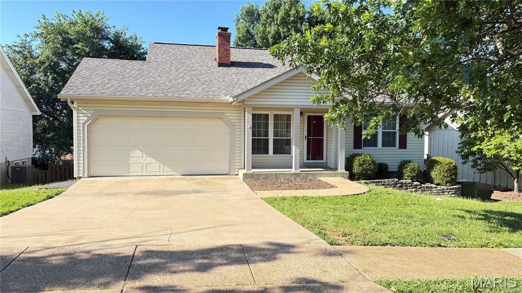 Walk in this lovely three bedroom home too see vaulted ceilings in living room,  kitchen updated with custom backsplash, cambria counters, all appliances included. The Kitchen opens to deck overlooking a large fenced yard, awesome patio area. Full finished lower level, family room, full bath. Large laundry room with washer & dryer.  Thermal windows, updated baths. Two car garage. Located in Spring Glen Three Subdivision.