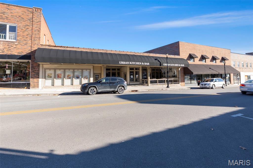 Situated in the heart of historic downtown Cape Girardeau, 20 North Spanish Street offers a rare opportunity to own a well designed and versatile commercial space. This 7,396 square foot building is thoughtfully configured into three distinct areas: a 60 seat banquet space, a 135 seat main dining area, and a dedicated bar section. A covered outdoor patio provides seating for an additional 25 guests.

The property is already configured in a way that allows it to be easily divided into two separate units if desired. The kitchen is centrally located with direct access to both the main dining room and banquet area, creating an efficient layout for service and operations. Constructed with I-beam support, the building also allows for flexibility in opening the floor plan to suit a variety of concepts.
