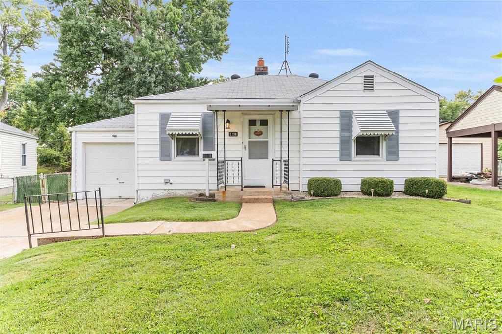 Darling 2 bedroom and 1 bath home with a one car garage on a beautiful lot that is fully fenced in St. Ann.  Meticulous and CLEAN home that has been lovingly maintained throughout many years.  Updates include a newer service panel.  The kitchen features solid oak 42" cabinets, large pantry and all appliances including the washer and dryer stay!! The main plumbing stack above ground has been replaced with PVC.  Seller thinks there are hardwood floors underneath the carpet in both bedrooms. The lower level is partially finished and could be used as additional living space. The lower level laundry room offers a large space that could be a workshop area.  The spacious and beautiful back yard features a covered patio.  

Great opportunity for 1st time home buyer or addition to rental portfolio!    Special Sale contract-seller to make no repairs or secure occupancy.
