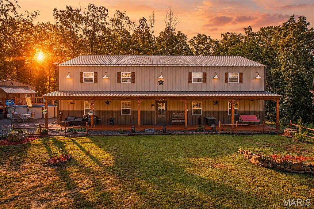 Welcome to your own private retreat! Situated on over 41 acres in Washington County, this unique property combines comfortable country living with an incredible setup for the avid hunter and outdoorsman.
At the heart of the property is an impressive 60' x 40' metal home featuring 18-foot ceilings, polished concrete flooring, 4 bedrooms and 2 bathrooms, and an open, spacious feel perfectly suited to relaxed country living.
Step outside and the property really begins to shine. The acreage is set up and ready for hunting, with 10 hunting stands, including a Vision House, remaining with the property. Whether you're looking for your own hunting ground, recreational getaway, or full-time country home, much of the work has already been done.
The property also features a stocked pond, an above-ground swimming pool, and a 25' x 30' detached garage, providing plenty of room for your vehicles, ATVs, hunting equipment, tools, and outdoor toys.
And while you'll enjoy the privacy of more than 41 acres, you're not far from everything you need:
Approximately 10 minutes from Highway 21
Approximately 15 minutes from Farmington for shopping, dining, and everyday conveniences
Approximately 5 minutes from Bismarck Lake Conservation Area
Approximately 8 minutes from Buford Mountain Conservation Area
Hunt. Fish. Explore. Relax.
With more than 41 acres, a stocked pond, established hunting stands, nearby conservation land, and a one-of-a-kind home, this property offers the kind of Southeast Missouri lifestyle outdoor enthusiasts dream about. Your private hunting and recreational paradise is waiting. PLEASE do not enter driveway without scheduled appointments all appointments must have a pre approval letter or proof of funds.