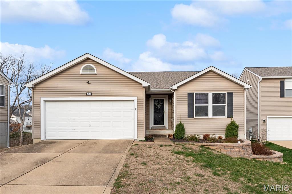Welcome home to 1213 Oakholt Court! This charming 3 bedroom/2 bath ranch is move-in ready and checks those boxes! Outside, enjoy cul-de-sac living with private, wooded area in backyard.  Low maintenance landscaping, nice size yard and room to expand and create the outdoor space you've imagined! Front landscaping pavers and retaining wall are a recent upgrade! Inside, the split bedroom concept awaits with 2 bedrooms and full bathroom at the front of the home. All bathrooms have updated: new lighting, vanity and toilet. Floors are convenient and easy to care laminate throughout the house! Open style living room, dining and kitchen area. The kitchen has a fresh and modern feel with updated cabinets, backsplash, countertops, and appliances. Nice size primary bedroom with en suite bath! Walk-in closet is spacious! Lights and ceiling fans throughout the home are updated-no projects left to do! Roof is less than 2 years old (back half of roof replaced with recent storm), new siding on back of the house, new gutters throughout and new water heater. Don't forget the full, unfinished WALK OUT basement with rough-in bath for future expansion. Community pool and clubhouse are READY for you in the summer! We are marching into warmer weather, make this charmer yours before someone else grabs it!