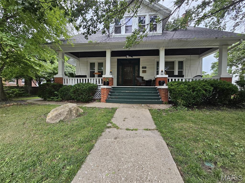 Charming Home Full of Character! If you love old-house charm, you're going to love this 4-bedroom, 3-bathroom home! It has beautiful original woodwork and hardwood floors throughout, giving it so much warmth and character. The kitchen features marble countertops with marble also found in two of the bathrooms. The wood-burning fireplace makes the living space extra cozy, while the gorgeous stained-glass windows you don't see in just any home. Outside, grab a cup of coffee and relax on the shady front porch with the porch swings, or enjoy the fenced-in backyard. The 3-car detached garage gives you plenty of space for vehicles, storage, hobbies, or whatever you need. And the location is hard to beat! You're close to schools and just a short distance from downtown Hillsboro, where the community is thriving with local shops, restaurants, and activities. A beautiful home with tons of character, plenty of space, and a great location. Come take a look!