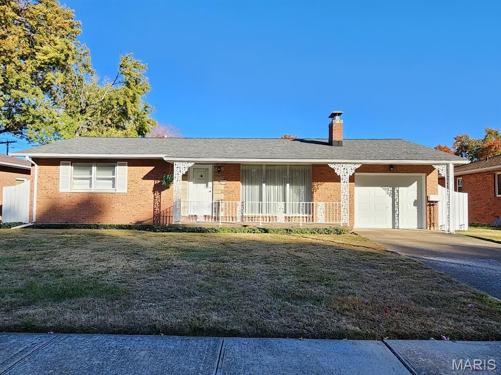 Meticulously cared for ONE owner home! Its evident this home was loved! Located close to the park and school and not far from shopping & dining, this brick ranch is clean and ready for its new owner! Entering in from the covered front porch, youll be welcomed by the spacious living room with brand new flooring, huge to the floor window that allows lots of natural light and a cozy wood burning fireplace! Just in time for winter! The separate dining area leads to the kitchen that has space for a table and tons of cabinets!  Both bedrooms are a good size also with brand new flooring and the full bathroom was recently updated as well! The full partially finished basement is clean and in great condition with a finished area that connects to the laundry storage area and has a sink & appliances that all stay! There is also a bonus finished family room area with brand new flooring! This home has veen freshly painted throughout! The backyard is beautiful and large with a patio area! The attached garage offers parking offstreet or would be a good workshop/hobby area! The hvac is also newer! You definitely should put this one on your tour list! Must see to appreciate!