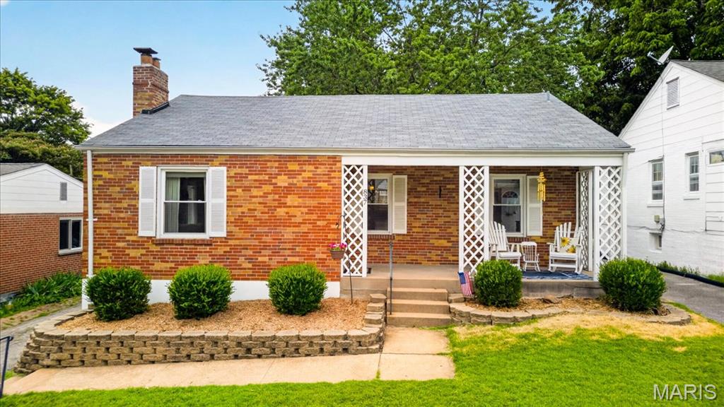 Open House Canceled! Discover the perfect blend of classic St. Louis charm and contemporary comfort. Nestled in the highly desirable neighborhood of University City, this beautifully maintained brick bungalow offers timeless character, warm hardwood flooring, and a welcoming floor plan designed for both comfortable everyday living and effortless entertaining. From the moment you arrive, the inviting front porch provides a peaceful retreat with a comfortable setback from the street, creating the perfect place to relax, enjoy a morning coffee, or unwind at the end of the day.
Inside, the sun-filled living room is anchored by a charming wood-burning fireplace, creating a warm and inviting focal point for gatherings with family and friends. Abundant natural light pours through the windows, enhancing the home's bright and airy feel throughout both the living spaces and bedrooms. The separate dining room offers an elegant setting for holiday meals, dinner parties, and special occasions, while the beautiful wood flooring throughout the main level adds warmth and continuity to the home's classic appeal. New dishwasher (October 2025), new disposal (November 2024), Shed updated—painted; gutters and shelving added (December 2024), Garden added (December 2024).
With 2 bedrooms, 2 full bathrooms, and more than 1,500 square feet of finished living space, including a partially finished lower level, this home offers exceptional flexibility to suit a variety of lifestyles. The lower level is an entertainer's dream, featuring a spacious recreation area complete with a bar, making it an ideal setting for game days, movie nights, celebrations, or casual gatherings. An additional finished room provides excellent versatility as a home office, guest space, workout room, hobby area, or media room. The conveniently located full bathroom on the lower level adds comfort and convenience for overnight guests and makes entertaining even easier.
Outdoor living is equally impressive. Step out onto the private deck, a perfect space for grilling, barbecuing, dining al fresco, or hosting friends and family throughout the warmer months. The fully fenced backyard offers both privacy and functionality, featuring a grassy area shaded throughout much of the day, creating a comfortable environment for outdoor activities, gardening, pets, or play. A parking pad adds additional convenience and flexibility beyond the attached tuck-under garage.
Practical features abound, including abundant storage space with built-in shelving, making organization simple and efficient. Whether you need room for seasonal items, hobbies, tools, or household essentials, this home delivers exceptional storage capacity rarely found in properties of this size.
Ideally located just minutes from Downtown Clayton, The Delmar Loop, Forest Park, Washington University, and an array of popular restaurants, shopping, and entertainment destinations, this home combines neighborhood charm with outstanding convenience.