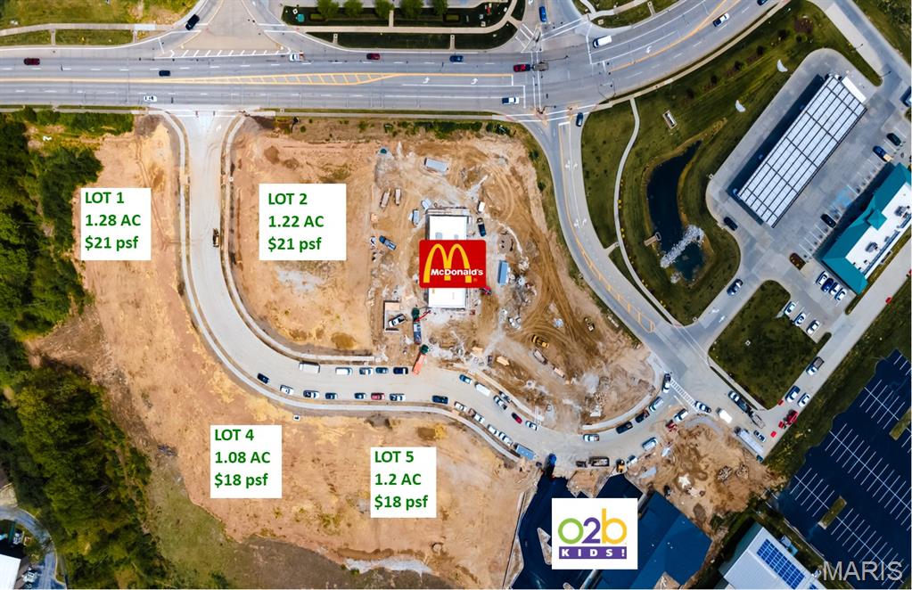 For sale, Lease or possible build to suit. 1.22 AC. Going to work side of the road. Hwy 40/64 Exit, Close proximity to Hwy I-70 Location: City, High Traffic