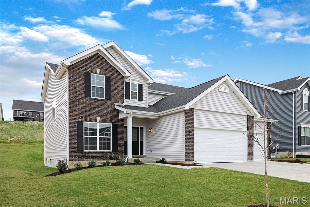 McBride Homes brand-new Nottingham 2-story home with 4BR, 2.5BA will be ready this winter! This stunning home features a 3-CAR GARAGE, 9ft ceilings, 6’ windows, & wood laminate flooring throughout the main floor. The kitchen is equipped with quartz countertops, Winstead Burlap 42” cabinets, center island w/ extended breakfast bar, stainless-steel GE appliances & walk-in pantry. There is a spacious great room w/window wall & ceiling fan, plus a formal living room & dining room. Upstairs you’ll find the primary suite w/ a spacious walk-in closet & luxury private bath w/walkin shower w/seat, large tub w/window & dual vanity. 3 bedrooms, loft space, hall bath & 2nd floor laundry room add convenience. Dual zone HVAC, 6 panel white interior doors, coachlights, LL ¾ bath rough-in & more! Hawk Ridge offers beautiful new homes in Lake St Louis near restaurants & entertainment! Enjoy peace of mind with McBride Homes’ 10 year builders warranty & incredible customer service! Display photos shown.