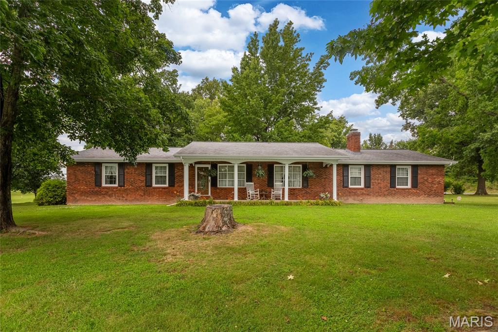 Discover Your Slice of Heaven in the Country at 1425 Coffee Rd, Eldorado/Raleigh, IL! 

Escape the hustle and embrace peaceful rural living in this charming ranch-style home situated on a spacious corner lot with approximately 2.5 acres of land. Perfectly positioned for privacy and convenience, this property offers the ideal blend of comfort, space, and country charm you've been dreaming about. 

Step inside this single-story ranch home (built in 1978, approx. 1,764–2,400 sq ft) featuring 3 bedrooms and generous living spaces designed for easy, one-level living. Natural light floods the interiors, creating a warm and welcoming atmosphere the whole family will love. Outside, the expansive lot provides endless possibilities—garden, play area, or simply room to roam and relax. 

Additional highlights include:Detached buildings and a 3-car garage for workshops, storage, hobbies, or extra vehicle/equipment parking.
Corner lot positioning that maximizes privacy and accessibility.
Peaceful country setting just minutes from Eldorado and local amenities, yet far enough away to enjoy true rural serenity.

Whether you're looking for a forever home, hobby farm potential, or a quiet retreat, this property delivers. It's your opportunity to own a true slice of heaven in the country—where mornings are greeted by birdsong and evenings by stunning sunsets.Note: The seller will need reasonable time to remove personal items prior to closing—flexible and cooperative closing timeline available.Don't miss out! Schedule your private showing today and imagine the possibilities at 1425 Coffee Rd. This gem won't last long—come make it yours! Contact us for more details or to set up a tour.