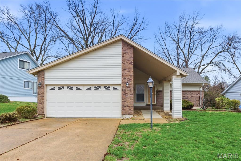 Welcome to 5325 Spring Trail Drive, a beautifully maintained home offering space, comfort, and peace of mind in a quiet Black Jack neighborhood.

This move-in ready home has already passed the municipal inspection, and the sellers are offering a home warranty covering major systems, giving buyers added confidence from day one.

Significant recent updates include a new roof installed in October 2025 and a new electrical panel installed in February 2026, providing important long-term value and reliability.

From the moment you arrive, the inviting covered entry and classic brick exterior create a warm first impression.

Step inside to a bright vaulted living room filled with natural light, where large windows and warm hardwood floors create an open and welcoming atmosphere perfect for relaxing or entertaining.

The formal dining room offers an elegant setting for gatherings and dinner parties, highlighted by a beautiful chandelier and clean modern finishes.

The spacious kitchen features rich wood cabinetry, stainless steel appliances, generous counter space, and a breakfast area that opens directly to the backyard deck. Large sliding doors fill the space with natural light and create an easy transition for indoor-outdoor entertaining.

Step outside to the elevated deck overlooking mature trees and a peaceful backyard, the perfect place for morning coffee, summer grilling, or relaxing evenings outdoors.

The primary bedroom suite provides a comfortable retreat with hardwood floors and a private bathroom. Additional bedrooms offer flexibility for family, guests, or a home office.

Downstairs, the finished lower level adds incredible additional living space, complete with a cozy brick fireplace, making it ideal for a media room, recreation space, or second living area.

Additional highlights include:

• Hardwood flooring throughout much of the main level
• Vaulted ceilings and abundant natural light
• Finished lower level with fireplace
• Spacious backyard with mature trees
• Large deck for entertaining
• Two-car garage
• Municipal inspection already passed
• Home warranty included for major systems
• New roof (Oct 2025)
• New electrical panel (Feb 2026)

Conveniently located near shopping, dining, parks, and major highways, this home offers the perfect balance of comfort, updates, and functional living space.

Schedule your showing today and see everything this home has to offer.