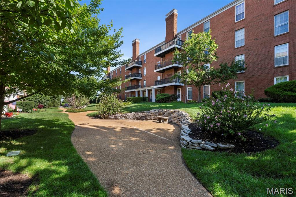 It’s your lucky day! This one is back on the market through no fault of the seller! Check out this spacious, end unit condo on the top floor for privacy with the opportunity to add your own personal touch! The floor plan is one of the largest in the neighborhood & features a welcoming eat in kitchen, living room w/ brick fireplace, large windows, Pergo floors & large private balcony! Enjoy 2 bedrooms, a bonus den/office, 2 full baths, 2 large walk in closets and an in unit laundry room! Kitchen fridge stays. Tons of natural light! Updated electric panel! Parking is easy & secure w/ 2 assigned garage spaces! The neighborhood offers a community pool & the HOA fee covers water, sewer, trash, street/ground maintenance & more! Convenient location, near the JCC, shopping, dining, airport & major highways! Pattonville school district. Property being sold AS-IS. Tour this one today before it’s gone!