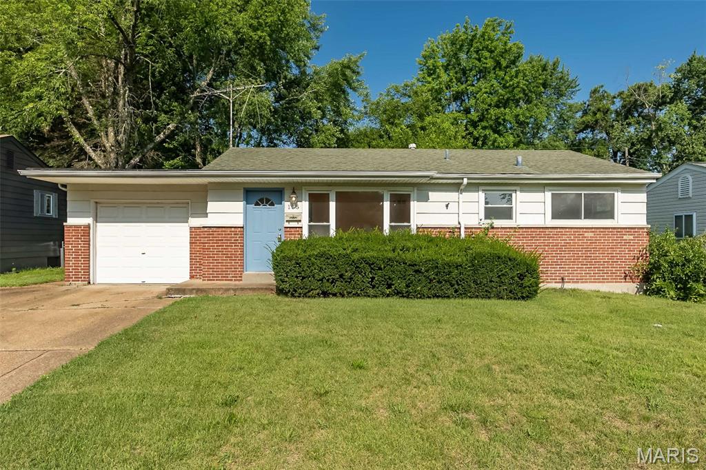 Welcome home to 155 Lynn Meadows Ln, tucked in a quiet North County Florissant neighborhood minutes from Koch Park, Bangert Park, and Saint Ferdinand Park — with splash pads, walking paths, an aquatic center, and pavilions all nearby for easy weekend fun. This mid-century gem has been freshly painted throughout, giving every room a bright, move-in-ready feel, while original hardwood floors have been uncovered and are ready to shine. The full bathroom features a brand-new vanity, and true MCM character lives on in the basement rec room, complete with a quintessential built-in bar perfect for entertaining. A usable attached garage adds everyday convenience, and the spacious backyard is a blank slate — ready for the garden, patio, or play space you've been dreaming of. Close to shopping, dining, schools, and easy highway access throughout Florissant and North St. Louis County, this home blends classic charm with modern updates in a location that's hard to beat. Schedule your showing today.