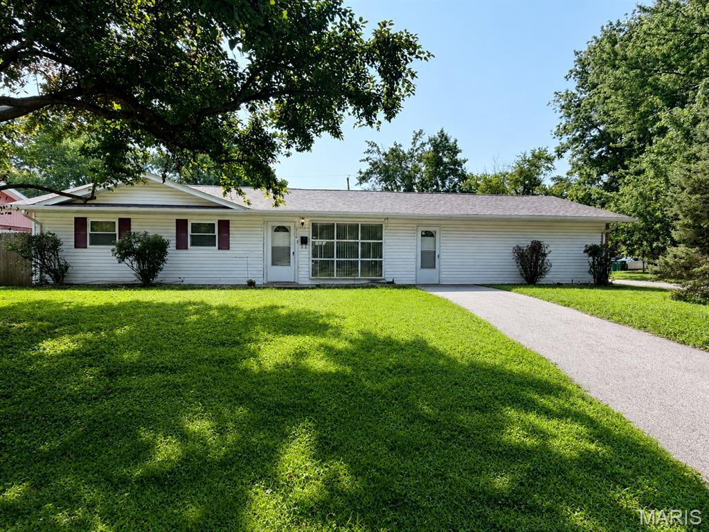 Welcome to this charming ranch-style home offering comfortable and convenient one-level living! This home features 3 bedrooms and 1.5 bathrooms with a practical layout and plenty of potential. The living area offers abundant natural light, creating a bright and welcoming space. Outside, enjoy a spacious fenced backyard and large paved patio, perfect for outdoor dining, entertaining, or simply relaxing. A private driveway provides convenient off-street parking. With its single-level layout, generous outdoor space, and inviting patio, this home is ready for its next owner. Schedule your showing today!