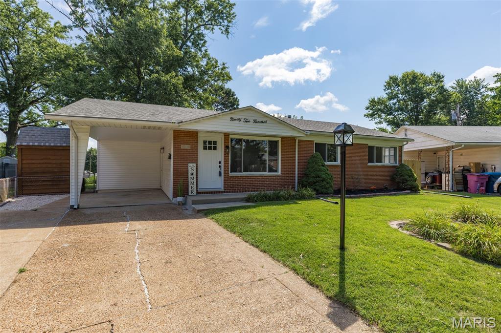 Move right into this completely updated 3-bedroom, 2-bath full brick ranch offering timeless charm, quality updates, and exceptional functionality. From the moment you arrive, you'll appreciate the attractive curb appeal, mature landscaping, and spacious yard.
Inside, refinished hardwood floors flow throughout the main level, complemented by updated lighting and a bright, inviting floor plan. The remodeled kitchen features custom soft-close cabinetry, new stainless steel appliances, updated solid surface quartz counter tops and durable luxury vinyl tile flooring that extends into both updated bathrooms.
Each bedroom is thoughtfully designed with custom closet systems, providing outstanding organization and storage. The partially finished lower level offers additional living space with luxury vinyl plank flooring, making it ideal for a family room, home office, fitness area, or recreation space.
Step outside to enjoy the fully fenced, level backyard—perfect for entertaining, pets, or play. The oversized carport provides generous covered parking, while the storage shed is equipped with electricity, making it an excellent workshop or hobby space.
Major improvements provide added peace of mind, including new windows, all new interior and exterior doors, new HVAC, lower-level drain tile expands the entire basement, and numerous additional upgrades throughout. This home is a must see!