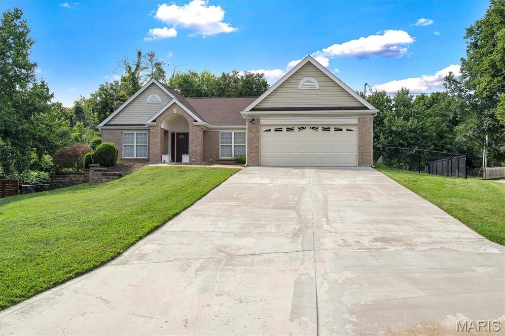 Welcome home to this Sunset Hills Great Room ranch, fabulous open floor plan, wood floors, oversized wide accessible doorways, accessible walk in shower in primary ensuite.  Split floorpan with 2 additional bedrooms and second full bath, all 3 bedrooms complete with big walk in closets. The large well equipped kitchen is wide open to breakfast room and great room just steps from the bright spacious dining room.  Walk out from breakfast room to deck overlooking the fenced yard.  The garage with concrete ramp is accessed through main floor laundry/mud room.  Need room to grow, you got it!  The walkout basement is wide open and ready to be finished if you have the need. Rough in for bath is already in place.   This home sits on a culdesac in the Lindbergh School District, super convenient location with loads of updates. It is move in ready, just unpack and enjoy!
