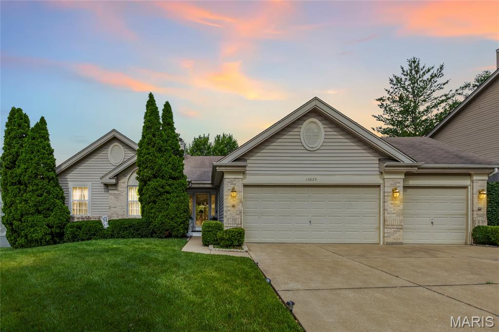 Welcome home to this beautifully maintained ranch in the highly sought-after Jamestowne subdivision. Built in 2003 and situated on a private, tree-lined quarter-acre lot, this spacious home offers 4 bedrooms, 3 full baths, a 3-car front-entry garage, and nearly 3,000 square feet of finished living space designed for both everyday comfort and entertaining. 

Step through the front door and you'll immediately be drawn to the home's most striking architectural feature—a stunning two-story wall of windows paired with a dramatic atrium staircase that fills the home with natural light and creates an unforgettable first impression. The vaulted great room serves as the centerpiece of the main level, featuring track lighting and a gas fireplace with log kit, creating a warm and inviting gathering space. 

The open floor plan flows effortlessly into the kitchen, breakfast room, and separate dining area. Located just off the kitchen, the breakfast room features a charming bay window and provides the perfect setting for casual meals and morning coffee. At the rear of the home, the separate dining room takes full advantage of the spectacular wall of windows and beautiful views of the private backyard, creating an elegant space for gatherings while showcasing one of the home's most impressive architectural features. Blinds throughout the home are included, and the home's atrium windows have been professionally tinted to help manage heat and provide UV protection. 

The kitchen offers ceramic tile flooring, ample cabinetry, and a full appliance package, including the refrigerator with icemaker line. The washer and refrigerator are both included in the sale. The main level features three bedrooms and two full baths, including a spacious primary suite designed as a private retreat. The primary bath includes a whirlpool tub, while generous closet space, including walk-in closets, provides exceptional storage. 

The impressive atrium staircase leads to a finished walkout lower level that dramatically expands the home's living space. This level is ideal for entertaining, multi-generational living, or overnight guests, featuring a large family room centered around a wood-burning fireplace with raised hearth, a dedicated movie/theater room, a fourth bedroom, and a full bath. With multiple living areas and direct access to the backyard, the lower level feels like a true extension of the main floor rather than a traditional basement. 

Outside, you'll discover one of the property's most desirable features. The walkout lower level opens to a spacious concrete patio overlooking an incredible backyard surrounded by mature trees that provide privacy and a peaceful natural backdrop. Whether you're hosting gatherings, relaxing with family, or simply enjoying the view, this outdoor space offers a rare combination of beauty and seclusion. An outbuilding provides additional storage for lawn equipment, tools, and seasonal items. 

Additional features include a transferrable home warranty, security system, irrigation system, TRIM permanent holiday lighting, gas furnace, gas water htr, hardwood flooring in one main-level bedroom, Dish Network availability and a 3-car garage. 

Tucked within the established Jamestowne community, this home offers the perfect balance of privacy and convenience. Residents enjoy nearby parks and recreation, convenient access to shopping, restaurants, and everyday services along Lindbergh Boulevard, Old Jamestown Road, and Highway 367, plus easy commuting to Boeing, major North County employment centers, and Downtown St. Louis. Located within the Hazelwood Central School District, this exceptional property combines distinctive architecture, abundant natural light, flexible living spaces, and a private backyard setting. From the dramatic atrium design and wall of windows to the finished walkout lwr lvl & park-like backyard retreat, this home delivers the space, comfort, and lifestyle today's buyers have been waiting for.
