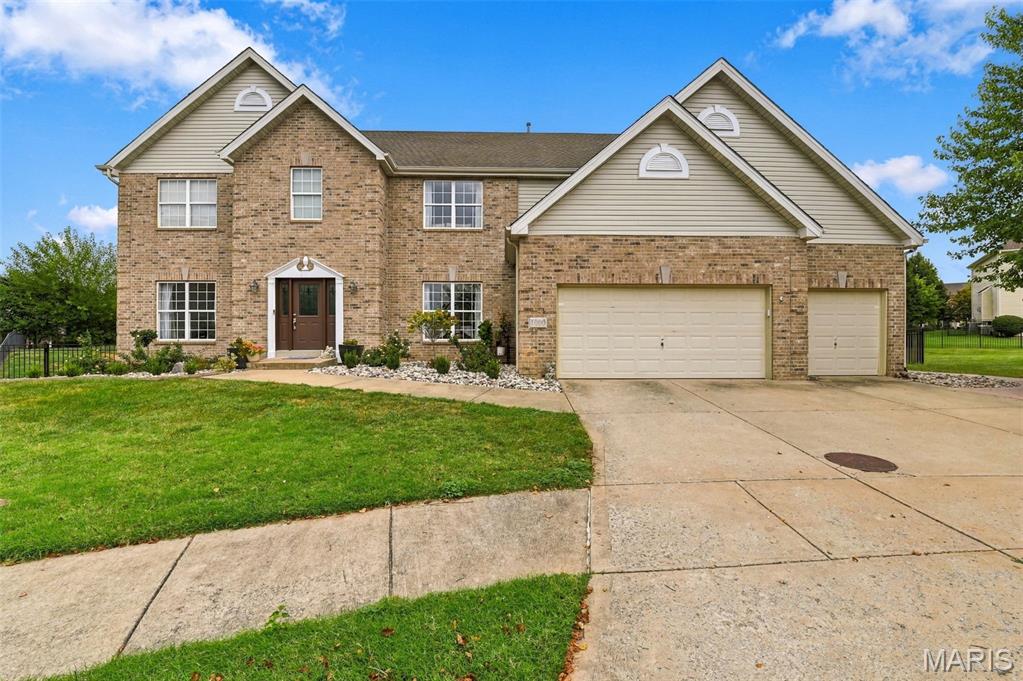 Welcome to 1000 Gardenbridge Place, a stunning brick-front 5-bedroom, 4.5-bath home in the desirable Talbridge community, offering over 4,000 square feet of beautiful living space. This home is packed with features, starting with a flexible main-floor in-law suite perfect for guests, multi-generational living, or use as a main-floor primary bedroom. Designed for everyday comfort and entertaining, it boasts soaring coffered and cathedral ceilings, 4-foot-wide staircase, an open floor plan, formal dining, a spacious great room with wood fireplace and automated Roman shades, and a well-appointed kitchen with a 66" Sub-Zero refrigerator, custom cabinetry, quartz countertops, pantry, a huge island with bar seating, and stainless appliances. There’s also a large office for working from home, main-floor laundry, and an upper-level family room/loft for added versatility. The primary suite is generously sized with his-and-her walk-in closets and a 9x16 ensuite. Every bedroom has its own walk-in closet for great storage.  

Outside, enjoy a private .41-acre fenced cul-de-sac lot with a large, stamped patio wired for outdoor speakers—perfect for gatherings or relaxing evenings. There’s also a gazebo, and a playset for the kids. The oversized 3-car garage has an EV Charging Station; unfinished full basement with egress window and rough-in bath offer plenty of space for future possibilities.  

This home is in the heart of it all, with easy access to the Streets of St. Charles, Historic Main Street, Vogt Brothers Park, Katy Trail, and Highways 70 and 364. Close to parks, trails, shopping, and dining, this Talbridge gem offers the space, location, and lifestyle today’s buyers want. Sellers are including a 1-year buyer’s home warranty. Open House Sunday 9/20 from 1–3.
