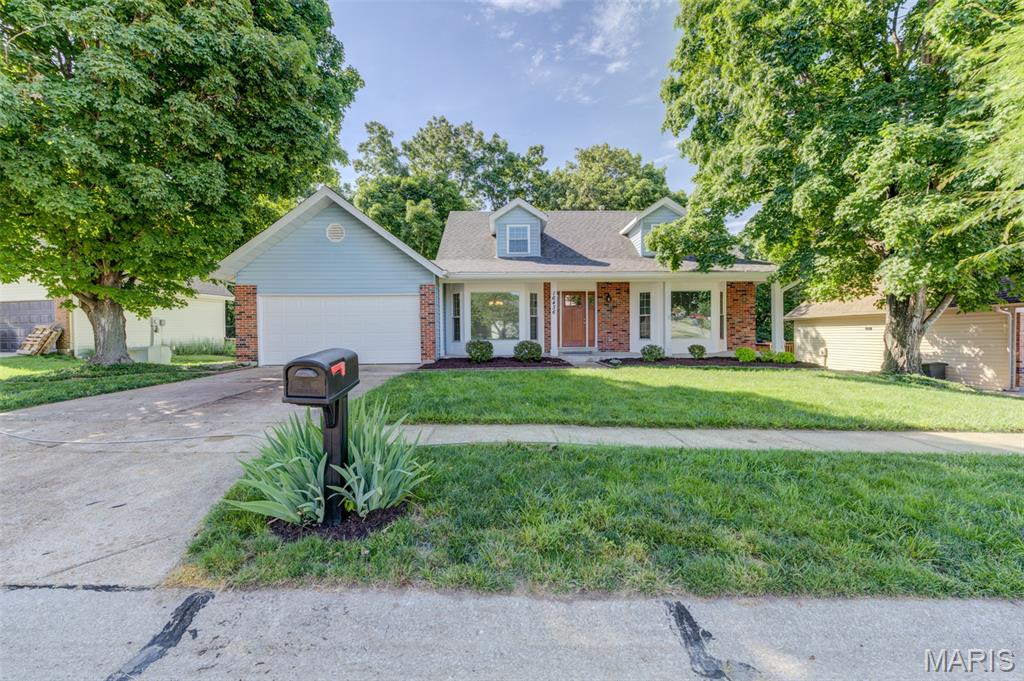 Showings begin on Saturday the 30th. Open House Sunday from noon to 3:00pm. Beautifully updated one and half story in popular Westglen Farms. This 4 bedroom home offers hardwood floors on the first floor, remodeled kitchen with 42" cabinets and crown molding, center island w/breakfast bar, granite counter top, plus an added pantry, and refrigerator stays. Main floor laundry just off the breakfast room. Generous size family room with a woodburning brick face fireplace, access to 14x16 deck looking back to treed common area. The master bath has been remodeled with an oversize shower with culture surround, updated tub and double vanities. Both dining room and living room have large bay windows with picture window center pane. Upstairs are 3 comfortable size bedrooms with an updated bathroom as well. Need extra living space, the unfinished walkout basement with rough-in plumbing is just waiting to expand your living space. Patio off the walkout and fire pit for those outside occasions sitting around roasting marshmallows. Cat5 lines are run to many rooms.
