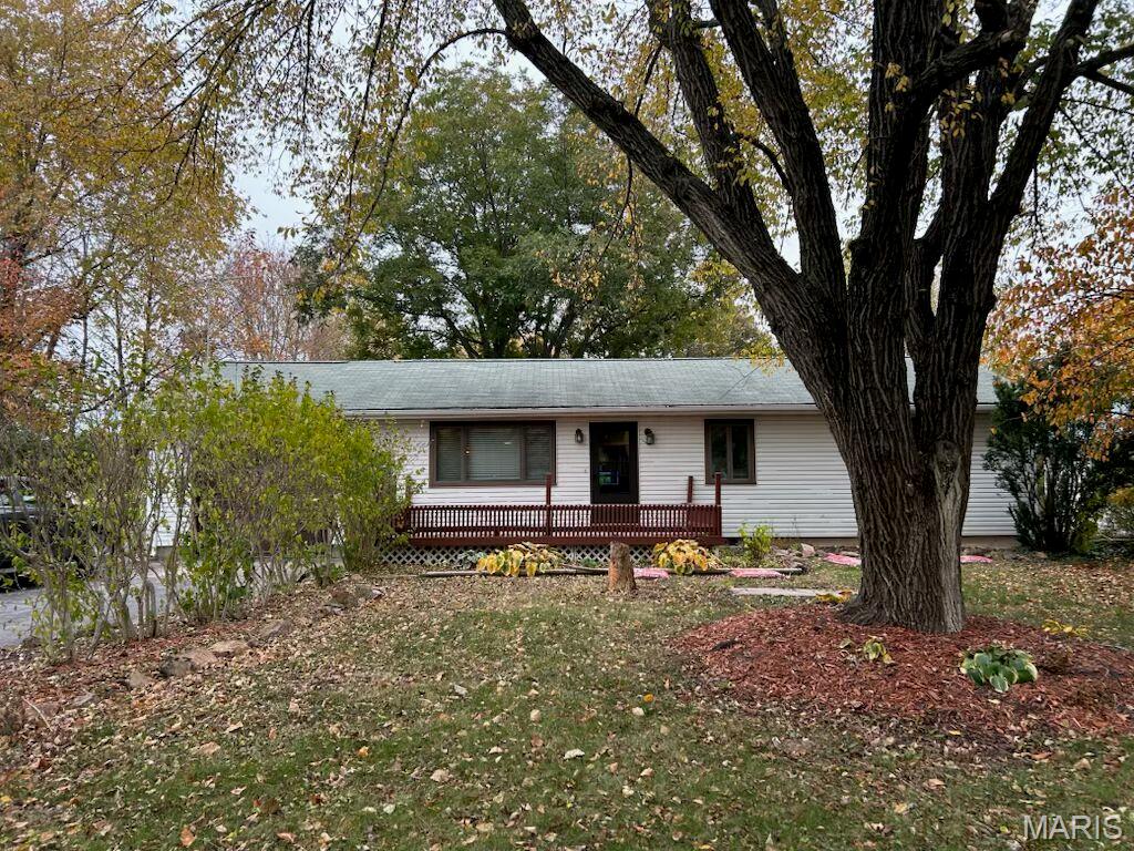 Have you been itching to stretch your legs with some more property? Peaceful living, while only being minutes away from the comforts of town? This is the home for you!! The perfect blend of rural living!! Welcome to your dream home!! Located on Old Route 66, your new 1800 sq foot, 3 bed, 1 bath home sitting on 7.22 acres with outbuildings is waiting for you!! Located just outside of Litchfield, this property offers the peace and serenity of country living without the long drive back into town or the interstate. Enjoy the seasons on your enclosed sunroom!! Walk into the elegance of a beautifully remodeled home! Large family room and living room combined! Dining room and Kitchen combined to give all the space needed for dinner or entertaining! A 1 car attached garage offers perfect parking out of the elements. True hardwood floors throughout the home!!! Two outbuildings in the backyard, perfect for storage, workshops, or endless possibilities! Enjoy your sprawling 7.22 Acres with the pond, creek, fruit trees, garden, walking trails, and boundless potential!! Call your favorite agent today to schedule a showing before it’s too late!!