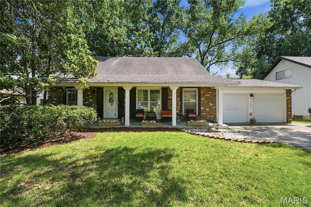 Gorgeous 4-bedroom, 3-bathroom home with updated kitchen & baths, and finished lower level. Hardwood floors throughout. Stately staircase that leads to two large bedrooms upstairs with full bathroom and loads of closet space. Two bedrooms on main floor with living, dining, kitchen, and breakfast room, at the rear. Staircase to lower level from the kitchen leads to a huge recreation room that is partially carpeted in front of the fireplace with laminate flooring on the remaining area. Ideal for a game room or entertainment area. Sliding door leads to backyard. Basement also includes an office and small full bathroom with shower, laundry/utility room, possible basement sleeping, and a walk-in storage area. Walk-out basement. Exterior is partially fenced and includes a patio on the main level off the back kitchen door. Walk-out basement. New roof to be installed before closing