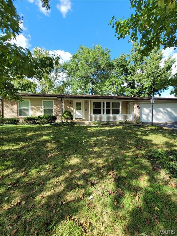YOU CAN'T BEAT IT! Desirable Lindbergh School District! Sunset Hills/Crestwood area, 3 bedroom 3 bath RANCH on 1/3 acre level lot with a shed!  Master with FULL BATHROOM, newer kitchen with Corian countertops and center island open to the dining/living room. Hardwood floor throughout with peg-n-plank in family room with wood burning insert in fireplace.   Completely remodeled a few years ago with newer appliances, doors, flooring, lighting, fixtures, toilets, vanities, painting, electric panel, 200 amp mast riser, and much more.    3-season patio enclosure steps down from family room.  This is a GREAT, sought-after walkable neighborhood. LOCATION! LOCATION!  LOCATION!! Long time homeowners in this area. Additional Rooms: Sun Room