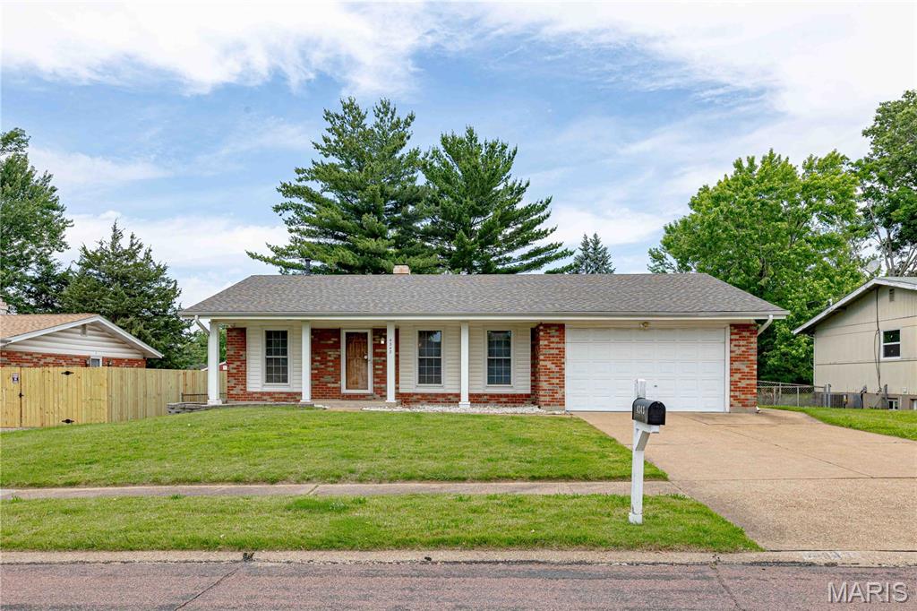 This home shines above the rest. This beautiful Three Bedroom 2.5 bath home has been updated and is standing tall. New Kitchen cabinets with soft close doors and drawers. New granite counter top, new flooring, new microwave, new dishwasher. New architectural style roof. Spacious 2-car garage. The hardwood floors have been refinished throughout. Updated hall bath with new vanity and new flooring. Updated master bath with new vanity and new flooring. Fresh paint throughout. Partially finished basement with new carpet. Basement bonus room with a half bathroom. Lots or storage shelving. Vinyl windows. Covered screened patio. Private back yard.  It has passed occupancy inspection.