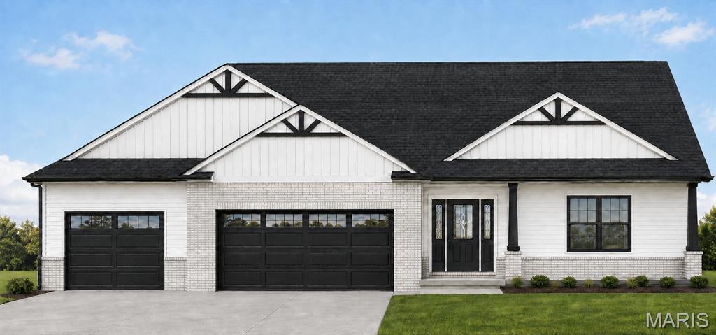 Welcome to this beautifully customized Remington by CNR Homes, located in Stone Briar. The striking exterior pairs crisp white siding and light brick with black roofing, garage doors, gutters, soffits, and decorative gable accents for a clean, modern look.

Inside, the open-concept great room and kitchen are enhanced by a vaulted ceiling and an electric fireplace with an extended wall designed to accommodate a large television. Thoughtful upgrades include luxury vinyl plank flooring in the primary bedroom and closet, a redesigned laundry area with cabinetry and a utility sink, an expanded mud bench, three pocket doors, and a shower with glass door in the hall bath.

The oversized 3-car garage features an extended third bay, glass-accented doors, front and rear service doors, a ceiling-mounted gas heater, utility sink, half bath, dedicated refrigerator circuit, and water line. An additional basement egress window, expanded concrete patio, service-door pads, and enhanced rear landscaping complete this thoughtfully personalized home.