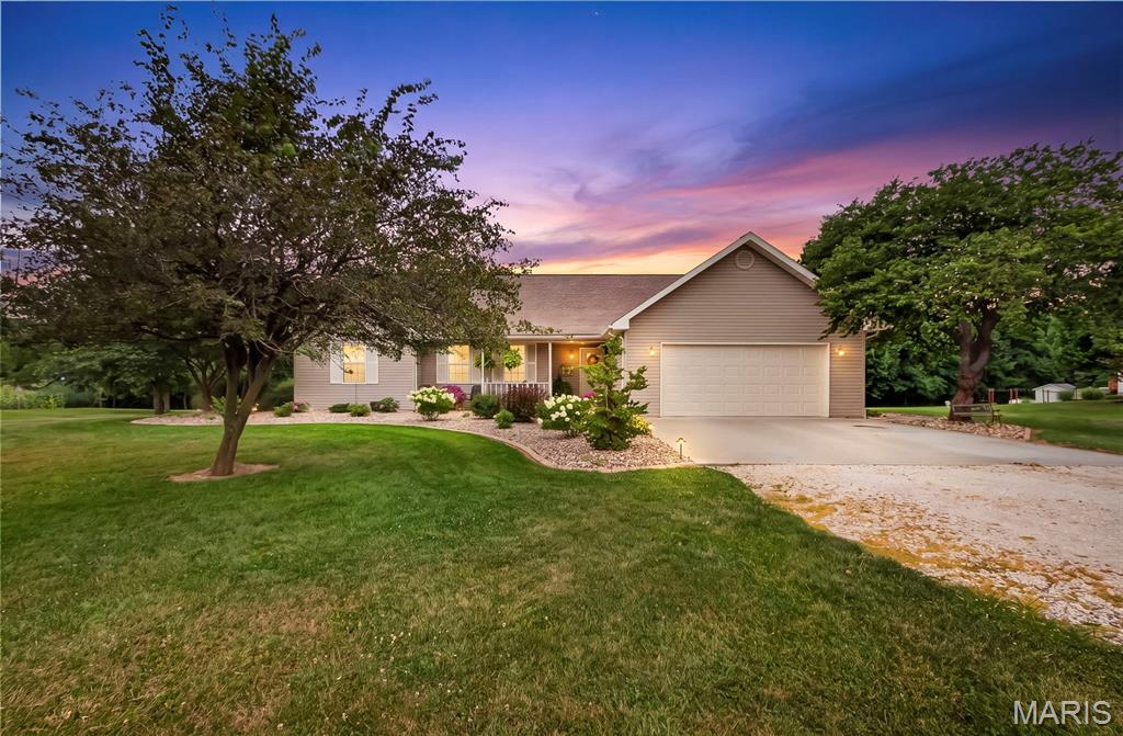 Welcome home! This beautifully maintained 4-bedroom, 3-bath home offers the perfect combination of comfort, space, and functionality. The inviting open floor plan features warm wood floors, abundant natural light, and seamless flow for everyday living and entertaining.
The finished walkout basement provides additional living space that's ideal for a family room, guest suite, home office, or recreation area. Step outside to enjoy the covered back deck overlooking the thoughtfully landscaped yard—perfect for morning coffee, evening sunsets, or hosting friends and family.
Need extra storage or workspace? You'll love the detached shop and separate gardening shed, offering endless possibilities for hobbies, projects, and organization.
With its spacious layout, beautiful outdoor spaces, and desirable features throughout, this home is one you won't want to miss. Schedule your private showing today!