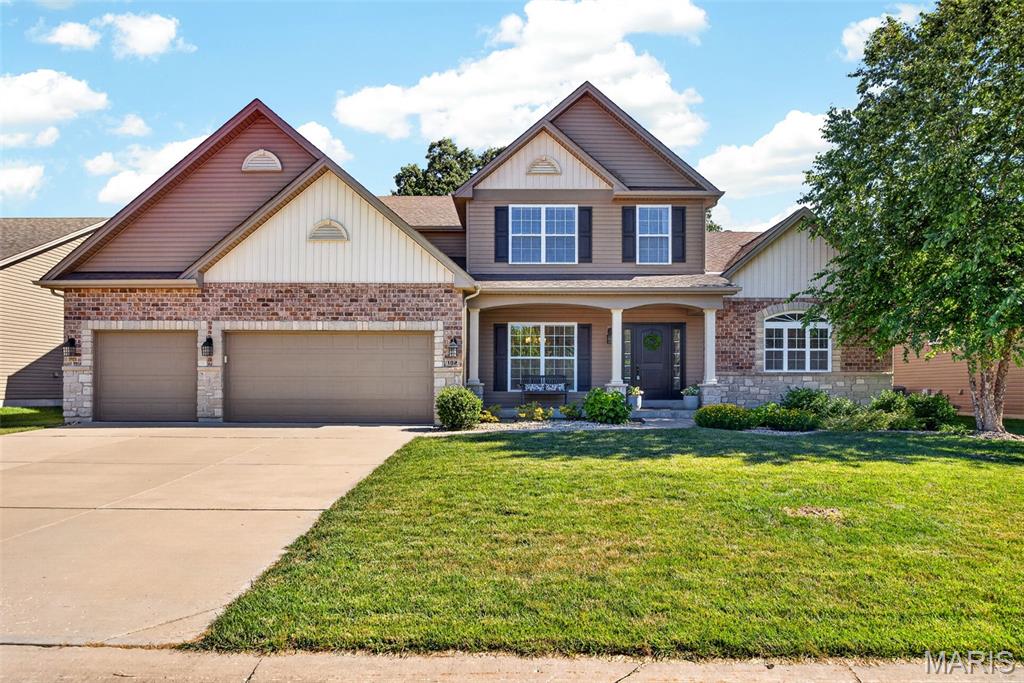 Welcome HOME to this stunning 1.5 story McKelvey Muirfield Model, proudly offered by its original owners and nestled on a quiet cul-de-sac lot backing to trees, this beautiful home is ready for its next chapter. Features you'll love: an open floor plan with abundant natural lighting, main floor master suite and luxurious owners' bathroom. The kitchen features a large island, ample cabinetry, walk in pantry and main floor laundry room. The upper levels offer three generously sized bedrooms, a private bathroom for one room and a Jack and Jill bath shared by the other two. The loft provides the perfect space for a second family room, home office, study area or playroom. 
Outside, enjoy peaceful, wooded views from the backyard and gather around the firepit for relaxing evenings with family and friends. The 3-car garage provides plenty of room for vehicles.  If you've been searching for a move-in-ready home with space, functionality, and a peaceful setting, this one check all the boxes.