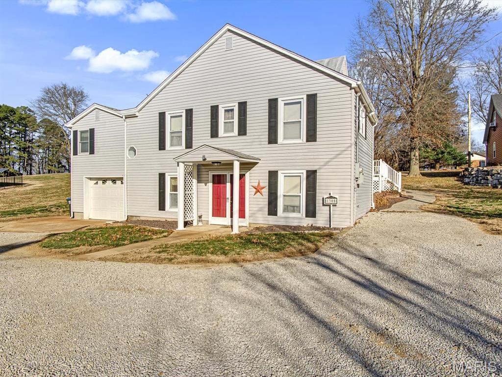 Nestled in the charm of Maeystown, this well-maintained 3 bedroom, 1 bathroom home offers a unique and functional layout with thoughtful updates throughout! Entry from the front door brings you into the lower level, creating a practical drop zone before heading upstairs to the main living area where all primary living spaces are located.

The upper level features a recently updated kitchen equipped with an electric cooktop, double wall oven, and appliances that stay, including the washer and dryer. The living and dining areas are spacious and inviting, ideal for everyday living or entertaining. Step out back to enjoy the covered deck, perfect for relaxing and taking in the peaceful surroundings.

This home is packed with valuable mechanical upgrades and conveniences, including a whole-home generator, boiler heat that is not very old, a sump pump with battery backup, and a Culligan water softener. The one-car attached garage is heated and offers generous workspace complete with a workbench, making it ideal for projects or hobbies.

The roof has been well cared for, with part of it being metal that was recently inspected and painted, and the remaining portion also recently inspected and in good condition. A leased propane tank through Pinnacle services the home.

With solid systems, smart updates, and a scenic Maeystown setting, this home offers comfort, reliability, and character in a truly special location!