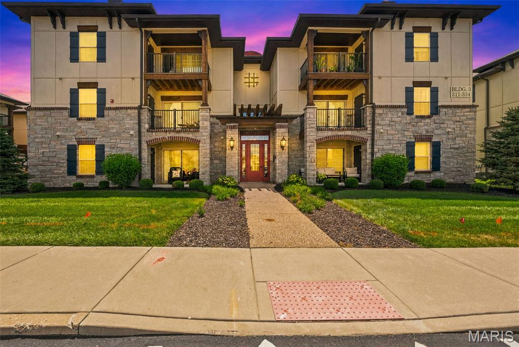 Welcome home to this beautifully maintained 2-bedroom, 2-bathroom condo built in 2020, offering modern finishes and a convenient location! Step inside to find stylish LVP flooring throughout the main living areas, creating a clean and contemporary feel. The well-appointed kitchen features stainless steel appliances, ample cabinetry, breakfast bar, and a functional layout perfect for everyday living and entertaining.

Enjoy the convenience of an in-unit laundry closet, spacious bedrooms, and two full bathrooms. Step outside to your private balcony, complete with an additional storage closet for added functionality. The secured building entrance with coded access provides peace of mind and an added layer of security.  $270/mo. fee includes water, trash and sewer.

Located just a short golf cart ride from charming downtown Cottleville, you’ll have easy access to local restaurants, entertainment, shopping, and community events. This move-in ready condo offers the perfect blend of low-maintenance living, modern amenities, and an unbeatable location!