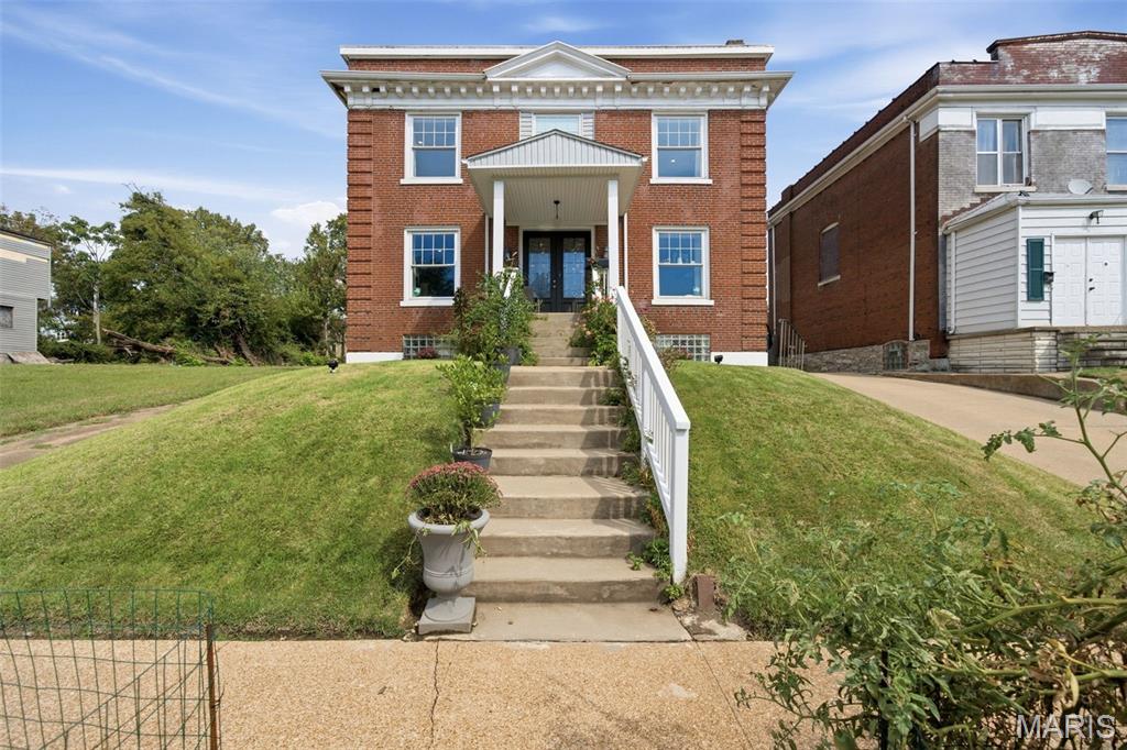 Built in 1909 and completely renovated in 2020, this all-brick home perfectly blends historic character with the modern amenities and technology of today. Step inside to a completely open floor plan featuring beautiful solid oak floors and soaring 10-foot ceilings. The main level flows seamlessly from the living room to the dining area and kitchen, with a convenient half bath and bright sunroom providing even more living space.
Upstairs, you’ll find three bedrooms and two full baths, including a spacious primary suite with a walk-in closet featuring custom shelving, dual vanities, and the ultimate convenience—laundry right in the primary bath!
The finished walkout lower level adds impressive versatility with a fourth bedroom with egress, full bath, and recreation/living area—perfect for guests, extended family, a home office, gym or additional everyday living space.
What truly sets this home apart is the incredible investment in smart-home technology, energy efficiency, comfort, and convenience. The extensive 51-panel solar power system goes beyond solar alone, with an impressive 40 kWh of battery storage for added energy independence and peace of mind. Two Span smart electrical panels allow for app-based energy monitoring. Dual HVAC systems with Nest thermostats provide zoned comfort, while smart lighting and fans, an Arlo security system with nine cameras and video doorbell, whole-house water softener and filtration, and a sophisticated sump pump system with battery backup and smart monitoring add another level of convenience and peace of mind. The kitchen continues the upgrades with reverse-osmosis water filtration with UV sanitizing, a pot filler, Samsung smart refrigerator, premium dishwasher, gas range, and built-in microwave.
Outside, the fully fenced backyard and gated driveway lead to an oversized 2-car garage equipped with two smart EV chargers, plus an additional oversized 2-car carport. And the location is just as impressive—near the Delmar Loop, The Pageant, shops, restaurants, entertainment, and Forest Park.
Historic architecture, a complete modern renovation, incredible smart-home and energy upgrades that offer significant homeowner savings, flexible living space, and a fantastic location— 6007 Cates offers a combination you simply don’t find every day.