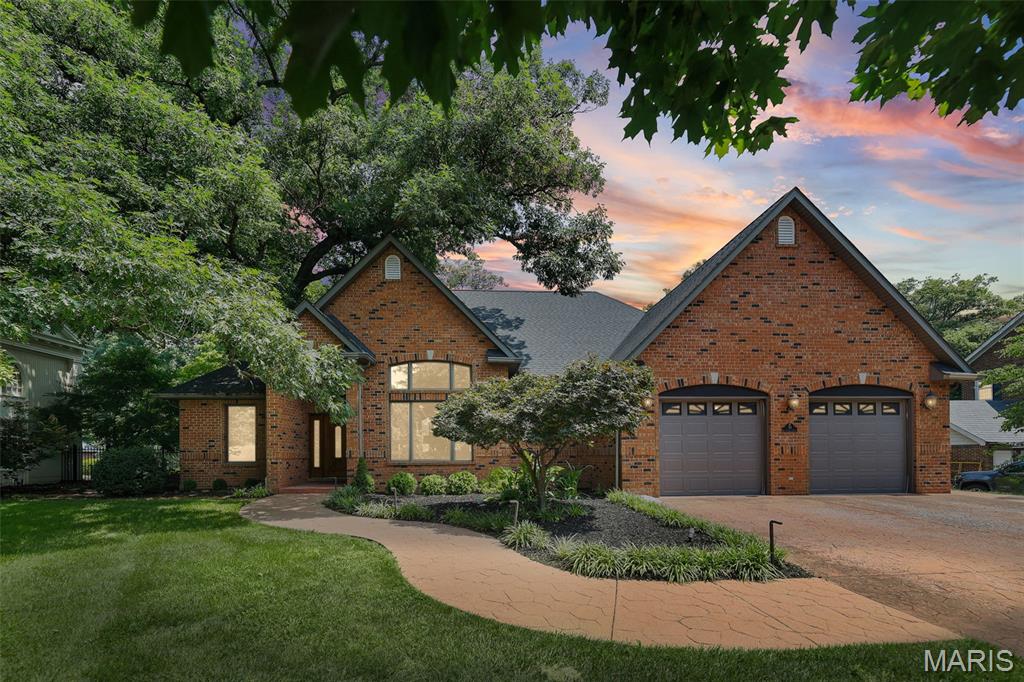 Welcome to this exceptional full-brick, raised ranch, where architectural elegance and custom, upgraded construction meet modern luxury. Designed with dramatic space and entertaining in mind, this residence pairs grand spaces and clever, functional design. Soaring vaulted ceilings and a breathtaking wall of windows flood the home with natural light. A striking atrium floating staircase anchors the living space and flows seamlessly into the hearth room, which features a gas fireplace, a covered balcony, and a separate dining area. The chef's kitchen features premium finishes and high-end appliances. A private sanctuary featuring two separate en-suite bathrooms and two spacious closets. A dedicated main-floor laundry streamlines your daily routine. The entertainment-ready walk-out lower level features a massive living area, a custom wet bar, a private guest bedroom, and a full bathroom. Prioritize health and safety with a dedicated exercise room with tons of natural light, a private sauna, and even a secure safe room. There is plenty of storage in the unfinished workshop, and a hidden staircase leads to the attached oversized garage. A peaceful, private outdoor retreat is perfect for relaxation. 
So much more information on the custom, upgraded construction and amenities! 
Professional pics coming soon!