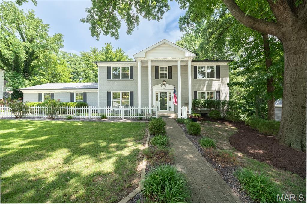 Grand Opening Open House on Saturday, July 25th 12 -2pm !   The home you have been looking for is here!  Welcome to one of the finest opportunities in the highly sought-after Chesterfield Hills subdivision! This beautifully updated luxury home offers approximately 3,725 square feet of finished living space, 4 spacious bedrooms, 3.5 baths, exceptional indoor and outdoor entertaining areas, and countless recent improvements.

From the moment you arrive, you'll appreciate the outstanding curb appeal featuring a NEW roof, gutters, down spouts, and window wraps (2026). Inside, the home combines timeless elegance with today's modern conveniences. The inviting main-floor family room offers a warm and cosy fireplace, while newer luxury vinyl flooring adds style and durability throughout several rooms.

The heart of this home extends outdoors where you'll discover an incredible private backyard oasis designed for entertaining and relaxation. Enjoy your morning coffee in the screened outdoor sitting area, host gatherings on the expansive deck, unwind in the included hot tub, or spend evenings around the beautiful custom stone fire pit, perfect for roasting marshmallows under the stars. Golf enthusiasts will love having their very own private putting green and driving practice net, creating the ultimate backyard retreat.

The impressive walk-out finished lower level offers exceptional flexibility with a spacious family room, a full bathroom, and a bonus room featuring a large walk-in closet—perfect for guests, a home office, fitness room, hobby space, or multi-generational living. Walk directly onto the expansive patio and enjoy the privacy of this beautifully landscaped setting.

The luxurious primary suite is truly a retreat of its own, featuring an oversized bedroom, a recently updated spa-inspired bathroom, and an impressive custom walk-in closet with an IKEA organisation system.

Car enthusiasts, hobbyists, and electric vehicle owners will appreciate the oversized side-entry garage complete with a spacious workshop area, upgraded 200-amp electrical service, and Tesla pre-wiring, making EV charging convenient and future-ready.

Additional improvements include a new water heater (2024) and an HVAC system professionally maintained through a Hoffman Brothers maintenance plan.

Residents enjoy neighborhood tennis courts, beautiful common areas, and low annual subdivision dues of only $400 per year, all while being just minutes from Chesterfield's premier shopping, restaurants, parks, hospitals, major highways, and award-winning Parkway schools.

Added Bonus! According to the seller, this home offers a VA assumable loan with an approximate 5.5% interest rate for qualified buyers. Contact for eligibility requirements and additional details.

If you've been searching for a move-in-ready luxury home in Chesterfield featuring a finished walk-out basement, oversized primary suite, private backyard, outdoor living spaces, EV-ready garage, workshop, golf practice area, fire pit, hot tub, screened porch, and exceptional updates, this is the one you've been waiting for.

Schedule your private showing today and join us for the Grand Opening Open House on Saturday, July 25th 12 -2pm !