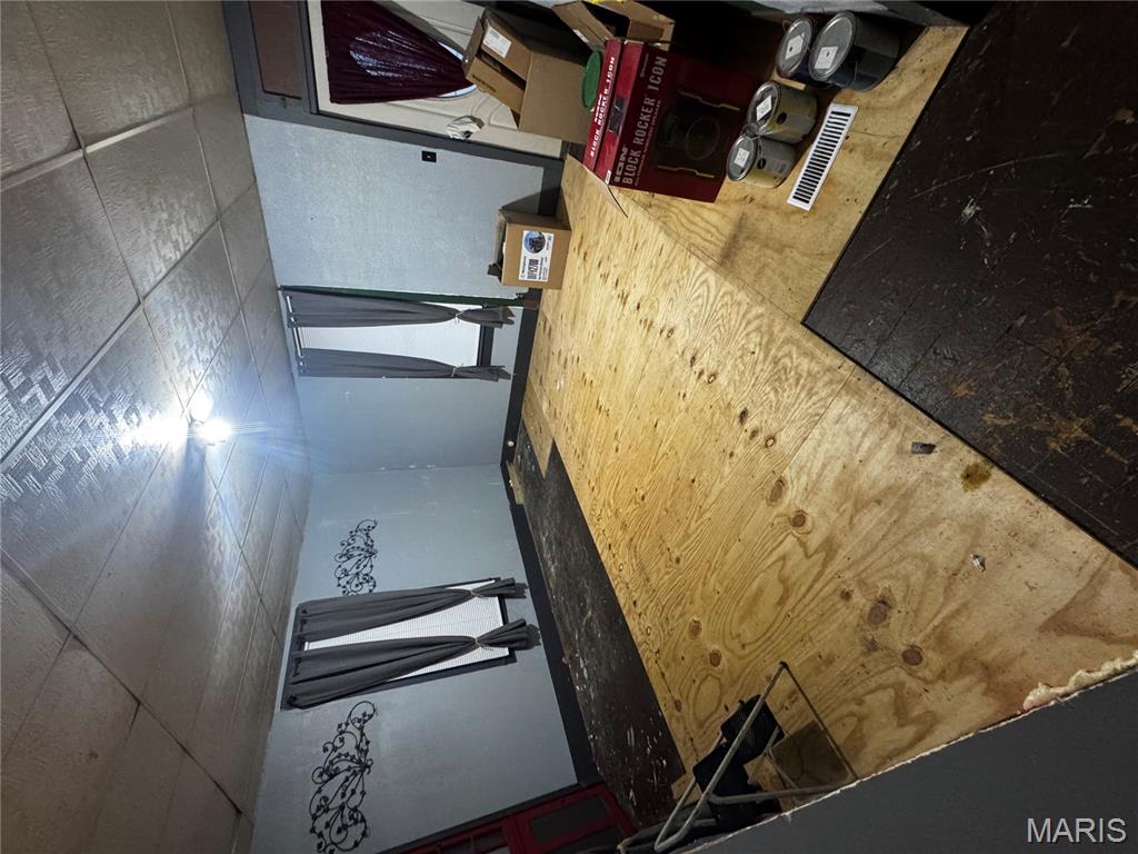A 2 bedroom, 1 bath fixer upper.  The current owners have done some good work, and nice landscaping with a great deck!