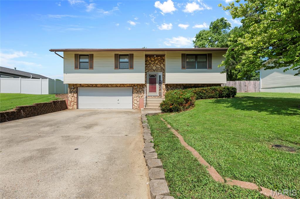 Welcome home to this spacious 3-bedroom, 3-bath bi-level home located in the highly sought-after Triad School District! This well-maintained home offers a roomy kitchen complete with all appliances, providing plenty of cabinet and counter space for everyday living and entertaining. The large living room is filled with natural light and offers a comfortable gathering space for family and friends. The primary bedroom features its own private bath, while the additional bedrooms provide ample space for family, guests, or a home office. The finished lower level boasts a large family room that's perfect for movie nights, game days, or a play area, along with a convenient half bath. A two-car attached garage offers plenty of parking and additional storage. With its functional layout, generous living spaces, and desirable location, this home is ready for its next owners. Schedule your showing today!
