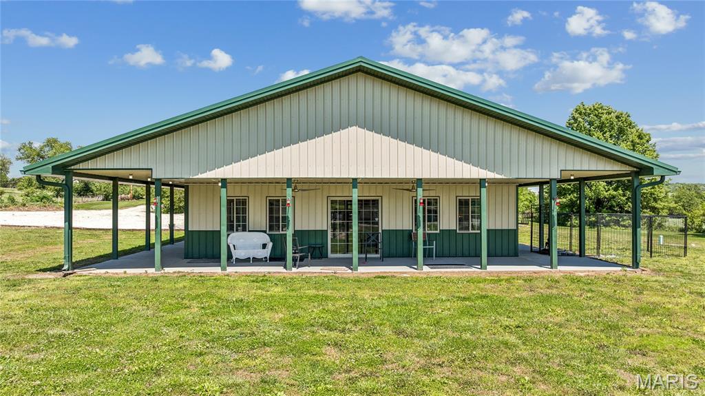 Welcome to a rare opportunity to own a thriving dog kennel designed for both comfort and care. This well-maintained facility offers spacious indoor and outdoor accommodations, thoughtfully designed to provide a safe, clean, and welcoming environment for dogs of all sizes.

The property features multiple kennels, secure exercise areas, grooming and bathing facilities, dedicated office space, and ample parking for clients and staff. Whether you're looking to expand an existing pet care operation or pursue your dream of working with animals, this turnkey business offers the infrastructure and reputation to hit the ground running.

At the heart of the property is a comfortable 3-bedroom residence featuring a spacious primary suite, offering the convenience of living just steps away from your operation while enjoying the privacy and tranquility of rural living. Large windows frame views of the surrounding acreage, creating a peaceful retreat at the end of the day. Conveniently located with easy access to surrounding communities, the kennel serves a loyal customer base and is well-positioned for continued growth through boarding, daycare, grooming, training, or other pet-related services. 

From the wagging tails to the established operations, this is more than just real estate. It's an opportunity to step into a business built around the love of animals and the trust of the community.