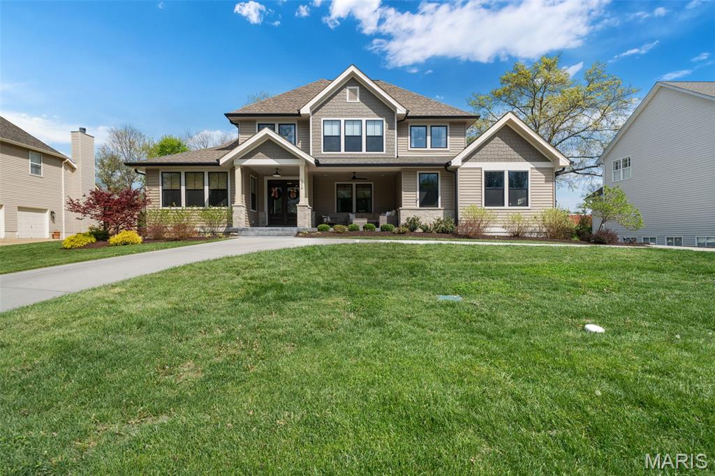 Welcome to this stunning Des Peres home on a rare half-acre private lot with beautiful landscaping, located in the highly sought-after Kirkwood School District. Just five years young, this home offers luxury finishes and thoughtful updates throughout.

Upon entry, you’re immediately struck by the openness of the home, complemented by stunning white oak floors and thoughtfully defined spaces, including a private office near the entry overlooking the front yard. Soaring ceilings and dramatic floor-to-ceiling windows create a bright, inviting atmosphere.

The stunning eat-in chef’s kitchen opens seamlessly to the living room and is equipped with top-of-the-line stainless steel Thermador appliances, a massive center island, abundant storage, a butler’s pantry connecting the kitchen to the spacious formal dining room, and an additional pantry leading to the laundry/mudroom—perfectly blending function and elegance.

The main-floor primary suite features tall vaulted ceilings and two sliding doors that walk out to the backyard patio. The en suite bath is a true spa-like oasis, complete with a soaking tub, dual vanities, a large walk-in shower, and a massive walk-in closet.

Upstairs offers three spacious bedrooms, while the newly expanded lower level adds significant living space, including an additional bedroom and full bath. Recent updates include a whole-home water filtration system and a circular driveway added in 2024.

The home also features a spacious three-car garage. The large, fenced backyard provides ample room for entertaining, recreation, or simply enjoying the privacy of this setting.

A remarkable home combining space, design, and an unbeatable location.