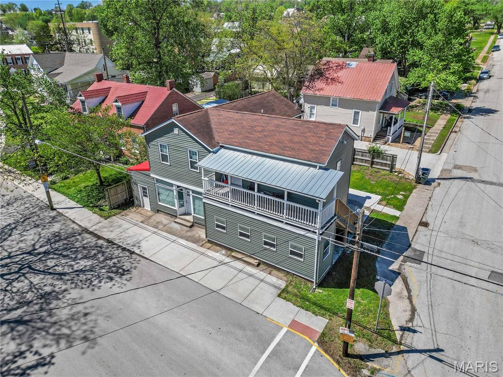 Renovated and income-producing, this well-maintained property in Hermann offers a fantastic investment opportunity. Featuring two long-term rental units, this property is already generating steady income with both units occupied under one-year leases. The lower unit has been beautifully updated and offers 4 spacious bedrooms and 3 full bathrooms, combining modern finishes with comfortable living space. The upper unit features 3 bedrooms and 2 bathrooms, providing a bright and inviting layout that tenants love. Situated in a desirable residential area, the property is conveniently located near local parks and schools, making it attractive for long-term renters. Enjoy the benefits of a walkable neighborhood in one of Missouri’s most popular and charming towns. Whether you’re expanding your portfolio or looking for a turnkey investment, this property offers immediate income and strong rental appeal in a sought-after location.