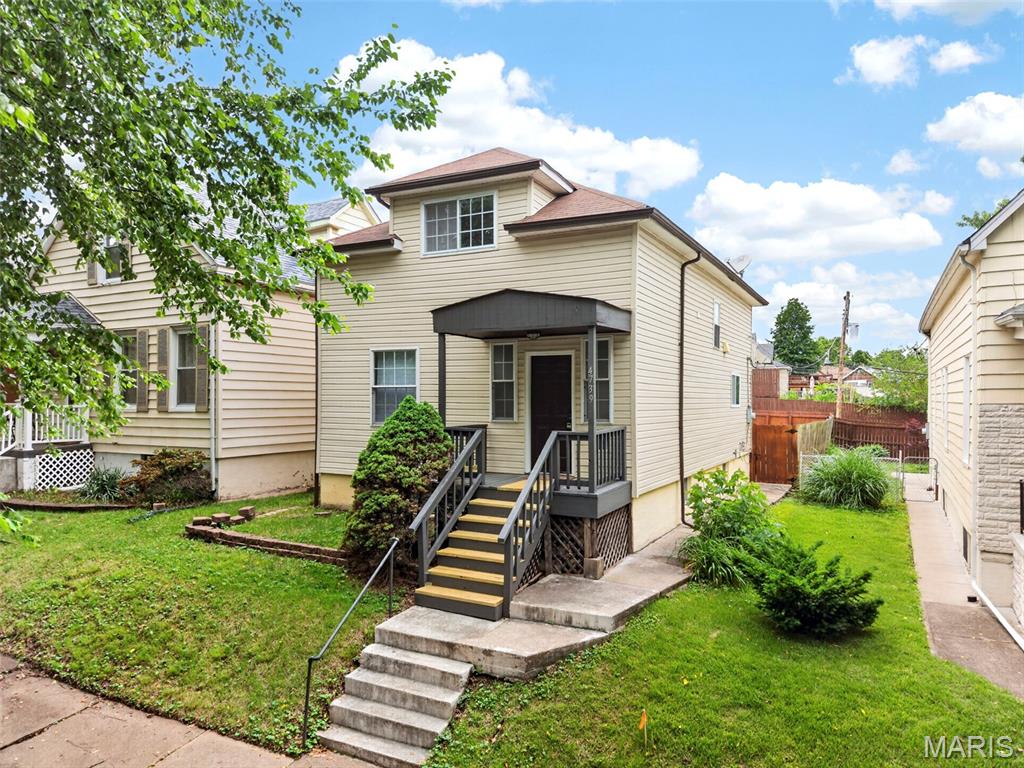 Welcome to 4739 where South City Charm Meets Modern Living! This beautifully updated 3-bedroom, 2-bath home nestled in one of St. Louis's most beloved neighborhoods checks every box. Step inside to a bright foyer where rich vinyl floors and recessed lighting set the tone for the open, flowing layout. The spacious living room flows seamlessly into the dining area, complete with a sliding glass door opening to your private back deck, perfect for hosting or unwinding. The kitchen boasts warm cabinetry with crown molding, dark granite countertops, mosaic tile backsplash, stainless steel appliances, and a double sink with a window view. A versatile main-floor bedroom doubles as a home office or guest suite, paired with a convenient full bath. Upstairs, two generously sized bedrooms feature vaulted ceilings, dual closets, and natural light, complemented by a second full bath and coveted upper-level laundry. Outside, enjoy a fully fenced backyard, rear deck, and a walk-out basement offering exceptional storage or finishing potential. Located minutes from parks, coffee shops, restaurants, and shopping. Schedule your showing today, this one won't last!