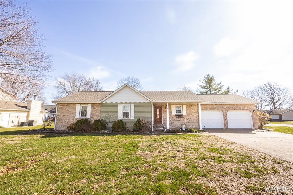 Welcome to this beautifully maintained home nestled in a highly sought-after neighborhood featuring outstanding community amenities, including a pool and pickleball court. Situated on a spacious corner lot, this property offers exceptional curb appeal with mature landscaping, a fenced backyard, and a 10x16 storage shed—providing both functionality and outdoor enjoyment. This move-in-ready residence has been thoughtfully updated inside and out, offering modern finishes and comfortable living spaces throughout. The 2017 kitchen remodel is truly the heart of the home, showcasing stunning custom white cabinetry, quartz countertops, a stylish backsplash, black stainless appliances, luxury vinyl tile flooring, and a distinctive butterfly-shaped island that seamlessly overlooks the living and dining areas—perfect for entertaining and everyday living. Luxury vinyl plank flooring welcomes you in the foyer and continues into the inviting living room, where vaulted ceilings and a cozy wood burning fireplace create a warm and open atmosphere. The bright dining area offers direct access to a generous 22x15 patio, ideal for hosting gatherings, grilling, or enjoying peaceful evenings outdoors. The main level also features two secondary bedrooms and a beautifully updated hall bathroom. The conveniently located laundry room sits between the second bedroom and the spacious primary suite for optimal functionality. The primary bedroom offers ample closet space and an updated ensuite bath designed for comfort and style. The finished lower level expands your living space with a large great room/rec room, perfect for a media area, playroom, or additional family space. An additional office provides flexibility for remote work or hobbies, along with a dedicated storage room to keep everything organized. Updates include:  Roof & Siding (2023)  Windows (2013)  Kitchen Remodel & Flooring (2017) This home combines modern updates, generous living space, and desirable community amenities in an exceptional location. Schedule your showing today and experience all this property has to offer before it’s gone.