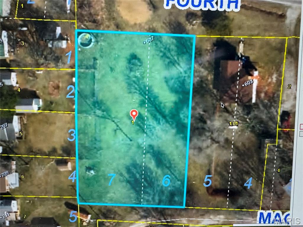 Over half an acre, this in-town lot provides a great opportunity for your future home or investment property. The property is already cleared, with corners marked by a surveyor helping reduce site preparation costs and allowing you to start planning right away. Public utilities are available. Conveniently located with easy access to local amenities while offering plenty of space to create the property you've been envisioning.