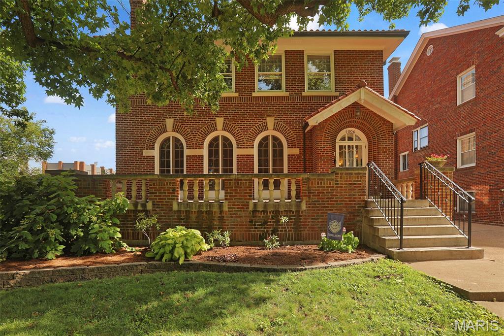 SHOWINGS BEGIN FRIDAY JULY 10.  This 1923 Italian Renaissance Revival residence hallmarks a formal brick terrace with stone balusters, clay tile roof and three soaring full-height, arched French doors that bridge the living space to the formal front terrace.  The details: 3246 S.F., +311 S.F. three-season enclosed patio room; 6 bedrooms, 3 full baths, 1 half bath; rare double featuring a detached 2 car garage, rear parking pad and a secondary side driveway.  While the historic integrity of the home has been preserved - including the 7x 9 entry foyer - the updated kitchen is a chef's delight offering a breakfast bar, stainless appliances and plenty of storage space.  The second floor layout provides ultimate flexibility.  Many options for a large primary bedroom, guest suites, and multiple dedication home offices. Newer HVAC is hot water heat (boiler replaced January 20 of 2025) with zoned forced air conditioning (new Marcy 8 of 2022).  Original blueprints for the home are available.