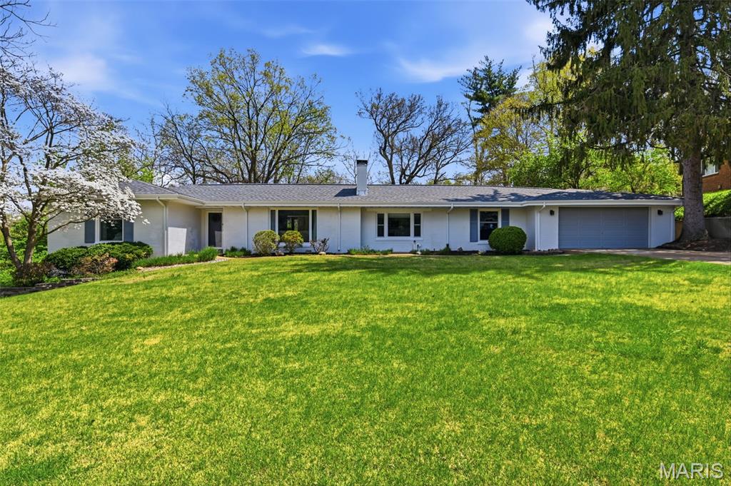 Welcome home to this custom-built sprawling ranch set on a beautifully elevated park-like lot with picturesque lake views. Offering 4+ spacious bedrooms and 3 full baths, this thoughtfully designed home blends comfort, character, and timeless style throughout. This home is nestled on 1.34 acres and is a private oasis, the back yard has complete privacy with 2 patios, a custom build shed, this is a home to be enjoyed inside and out. This is an absolutely amazing home.