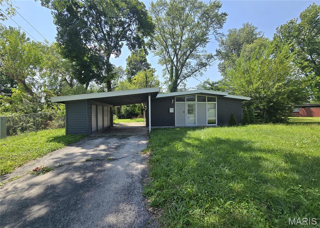 Welcome to 6551 January Avenue! This 4-bedroom, 2-bath ranch offers over 1,500 square feet of living space and a functional single-level layout. The home features a spacious living area, an updated kitchen with ample cabinet space, and a primary bedroom with a private full bath. Enjoy the large, level fenced backyard with a patio—perfect for relaxing, entertaining, or pets. Conveniently located near shopping, restaurants, parks, schools, Lambert International Airport, and major highways. Whether you're a first-time homebuyer, growing family, or investor, this property offers excellent potential. Schedule your showing today!