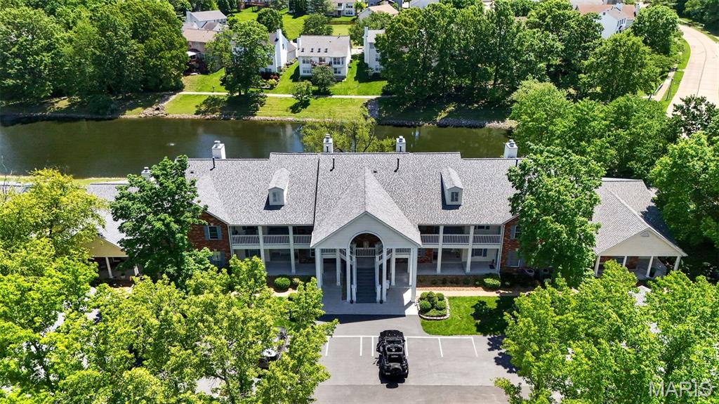 This fully renovated 3-bedroom, 2-bathroom condo blends modern luxury with serene natural beauty and easy living.  Located in the desirable Harbors at Lake Chesterfield that offers a clubhouse, fitness room, tennis courts, swimming pool, and a beautiful lake with a walking path. As you step inside, the great room is flooded with natural light , has a vaulted ceiling, gas fireplace, and outdoor access that offers panoramic views of the lake. There is neutral flooring and fresh paint throughout for easy decorating, ceiling fans, and recessed lighting.  You will appreciate the thoughtfully upgraded kitchen with an abundance of cabinets, granite counter tops, stainless steel appliances, pantry, and dining space. In the primary suite there is a large walk-in closet and the bathroom offers a double vanity, soaking tub and separate shower. Plus, the separate bedroom floor plan gives the primary a lot of privacy. Other updates include the HVAC, some appliances, LVP flooring, paint and lighting. This is a walkable area with grocery stores, shopping, restaurants, gas station, schools, parks, walking trails and public transportation and more.