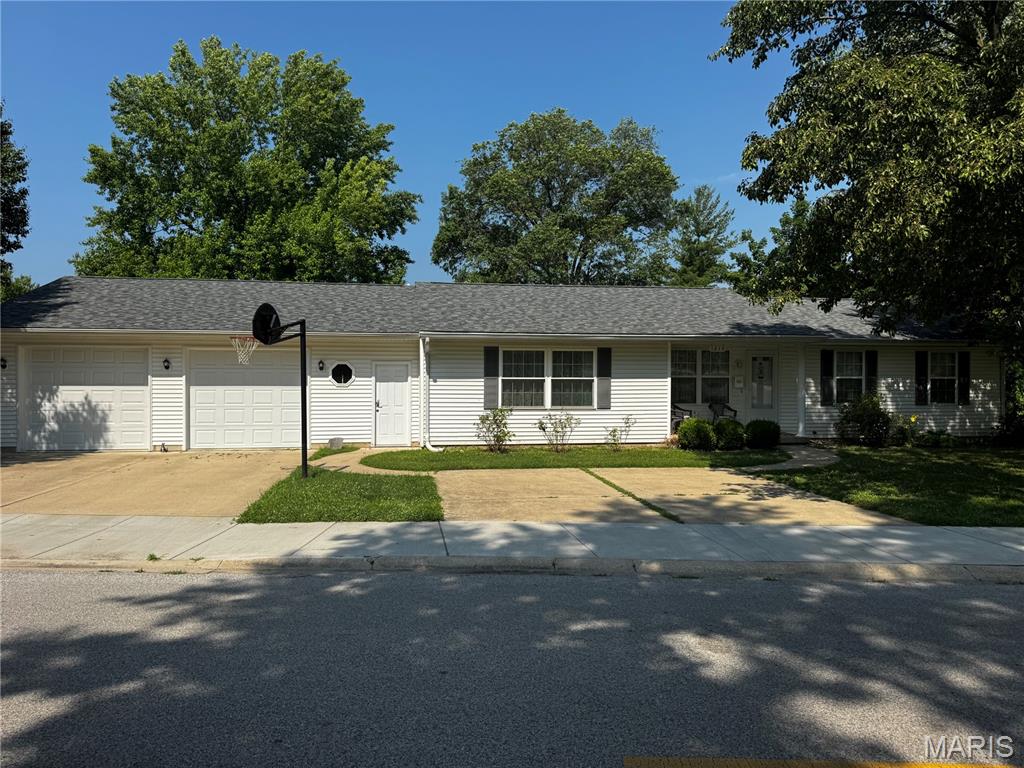 Well built 3 bedroom/3 bath home walking distance to schools and parks.  Home features both living room and family room with lots of space and storage.  Laundry room off of garage as well as a half bath and spacious area for either an office or whatever  you want to make it. This is a must see and is move in ready! Sellers are including a $1000 to buyer for flooring allowance