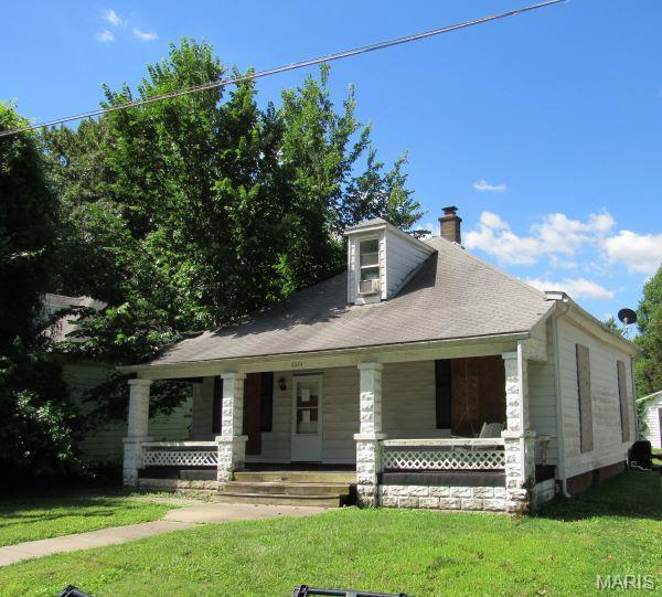 Discover this charming single-family residence built in 1900. Covered front porch, back deck off kitchen and detached garage. Second floor can be used as a bedroom or recreation area. Buyer and buyers agent to verify all MLS information including the measurements.