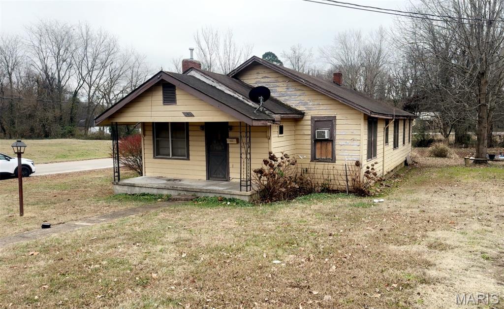 This 3-bedroom property includes a 4th non-conforming room that works perfectly as an office or bonus space. Located on a spacious corner lot, the home offers original hardwood floors and a well-built structure ready for updates. With good bones and flexible layout options, this property is ideal for an investor, renovation project, or buyer seeking sweat equity.