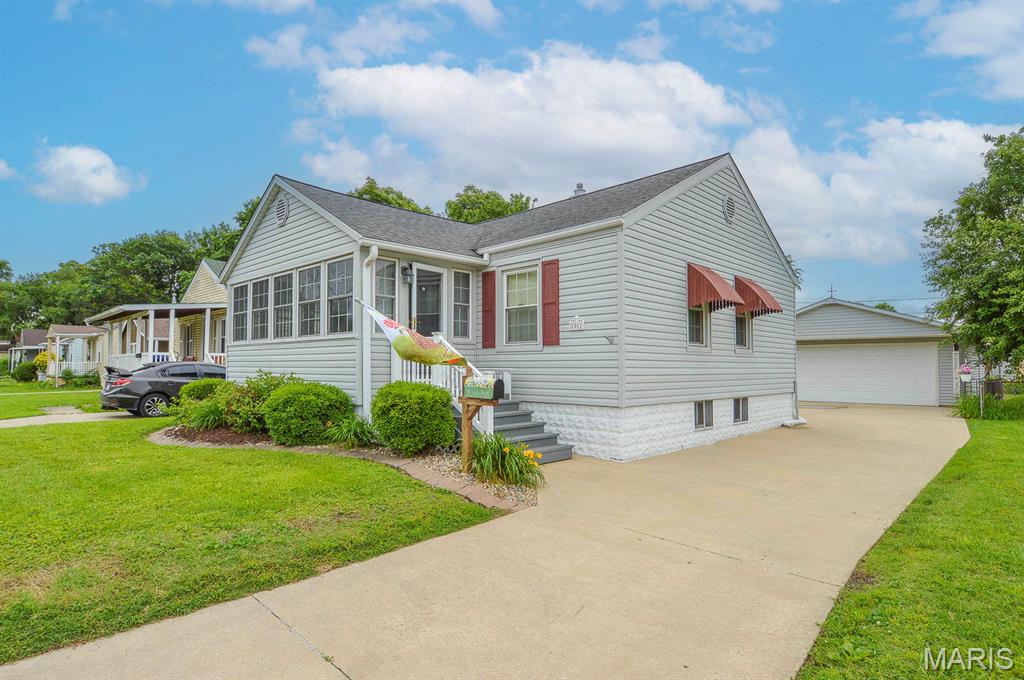 Price listed is Starting Bid Only. Bidding starts closing 7/1/2026 @ 5 p.m.  Welcome home to a place filled with charm, natural light, and the kind of care you can feel the moment you step inside. This delightful two bedroom, one bath home, features hardwood floors that stretch across the inviting living room and both spacious bedrooms. The recently updated bathroom offers a walk in shower and fresh modern touches. The cozy eat in kitchen makes everyday living easy with plenty of storage and all appliances included. Just off the kitchen, the sunroom becomes a favorite spot—surrounded by windows and overlooking the beautifully kept front lawn, it is perfect for morning coffee or quiet evenings. Downstairs, the full, partially finished basement expands your possibilities with a large flex room ready for hobbies, movie nights, or a home office, plus a separate storage room and laundry area. Outside, the oversized two car garage is a dream for anyone who loves projects, offering a workshop area, built in shelving, and full electric service. Recent updates to the home include a new furnace, smart thermostat, attic and rim joist insulation and crawl space encapsulation completed in 2018. Complete bathroom remodel in 2026, recently installed hot water heater and roof/siding replaced in approximately 2016. With parks, schools, and conveniences nearby, this lovingly maintained home is ready to welcome its next chapter. Property will sell under auction terms and be sold AS- IS, WHERE-IS. Seller, will not make any repairs as a result of any building, occupancy, or environmental inspections. Buyer will be required to sign an Auction Purchase & Sale Agreement if final bid is accepted by Sellers.